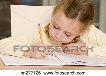 Stock Photo - girl doing homework. 
fotosearch - search 
stock photos, 
pictures, images, 
and photo clipart