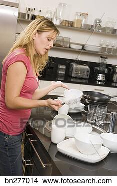 Stock Photo - woman doing dishes. 
fotosearch - search 
stock photos, 
pictures, images, 
and photo clipart