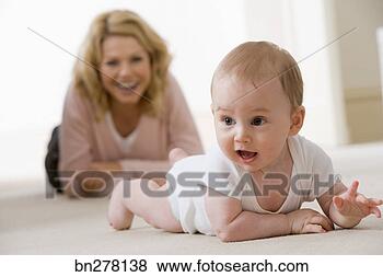 Stock Photo - mother watching 
crawling baby. 
fotosearch - search 
stock photos, 
pictures, images, 
and photo clipart