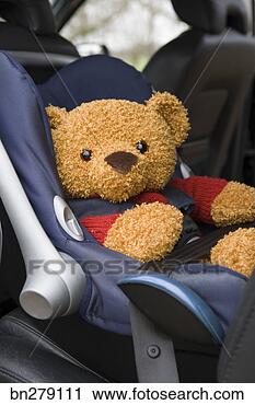 Stock Photography - teddy bear in 
car seat. fotosearch 
- search stock 
photos, pictures, 
images, and photo 
clipart