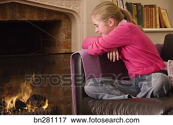 Picture - girl by fireplace. 
fotosearch - search 
stock photos, 
pictures, images, 
and photo clipart