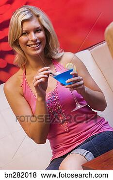 Stock Photo - woman with cocktail. 
fotosearch - search 
stock photos, 
pictures, images, 
and photo clipart