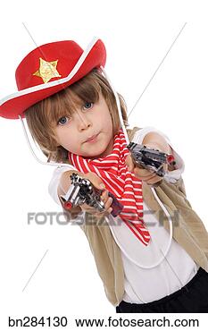 Stock Photography - boy in cowboy 
costume with guns. 
fotosearch - search 
stock photos, 
pictures, images, 
and photo clipart