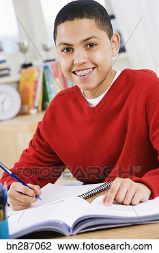 Stock Photo - boy doing homework. 
fotosearch - search 
stock photos, 
pictures, images, 
and photo clipart