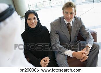 Stock Image - businesspeople 
meeting. fotosearch 
- search stock 
photos, pictures, 
images, and photo 
clipart