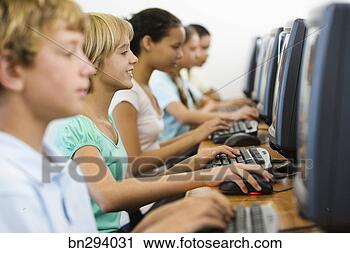 Stock Photography - student typing 
on computer. fotosearch 
- search stock 
photos, pictures, 
images, and photo 
clipart