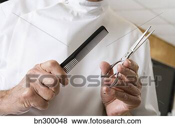 Stock Photo - barber with scissors 
and comb. fotosearch 
- search stock 
photos, pictures, 
images, and photo 
clipart