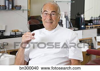 Stock Photography - barber sitting 
in chair. fotosearch 
- search stock 
photos, pictures, 
images, and photo 
clipart
