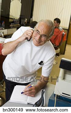 Stock Photograph - barber on telephone. 
fotosearch - search 
stock photos, 
pictures, images, 
and photo clipart
