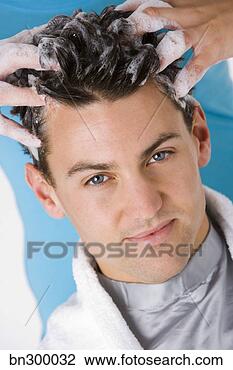 Stock Photo - man getting hair 
shampooed. fotosearch 
- search stock 
photos, pictures, 
images, and photo 
clipart