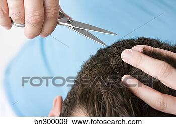 Stock Photograph - man receiving 
haircut. fotosearch 
- search stock 
photos, pictures, 
images, and photo 
clipart