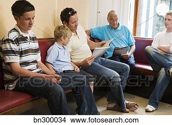 Stock Photo - people sitting 
in waiting area. 
fotosearch - search 
stock photos, 
pictures, images, 
and photo clipart