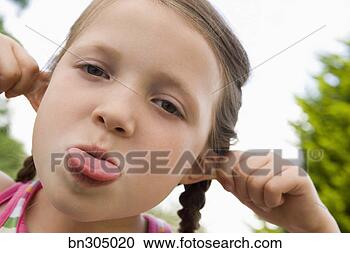 Stock Photography - defiant girl. 
fotosearch - search 
stock photos, 
pictures, images, 
and photo clipart
