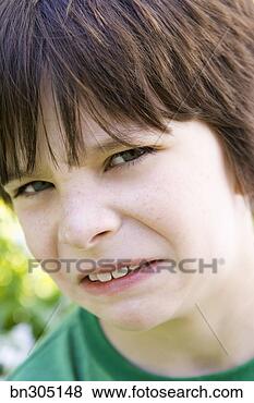 Stock Photo - disgusted boy. 
fotosearch - search 
stock photos, 
pictures, images, 
and photo clipart