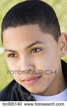 Stock Photography - serious teenage 
boy. fotosearch 
- search stock 
photos, pictures, 
images, and photo 
clipart