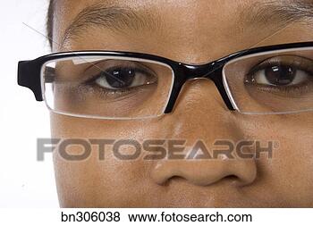Stock Photo - woman wearing 
eyeglasses. fotosearch 
- search stock 
photos, pictures, 
images, and photo 
clipart