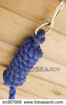 Stock Photograph - knotted rope. 
fotosearch - search 
stock photos, 
pictures, images, 
and photo clipart