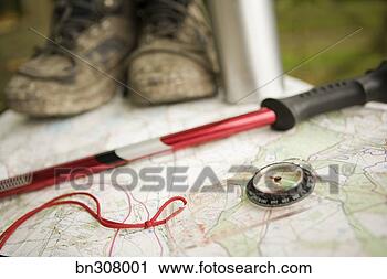 Stock Photography - hiking equipment 
with map and compass. 
fotosearch - search 
stock photos, 
pictures, images, 
and photo clipart