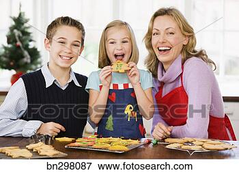 Picture - children and woman 
with christmas 
cookies. fotosearch 
- search stock 
photos, pictures, 
images, and photo 
clipart