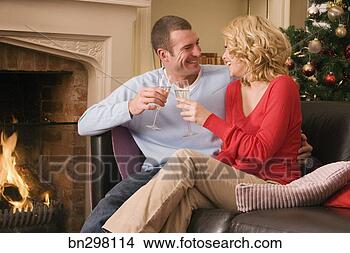 Stock Photo - couple toasting 
with champagne. 
fotosearch - search 
stock photos, 
pictures, images, 
and photo clipart