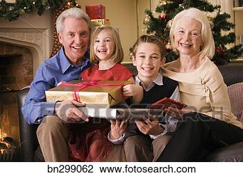 Stock Photo - grandparents and 
grandchildren 
at christmas. 
fotosearch - search 
stock photos, 
pictures, images, 
and photo clipart