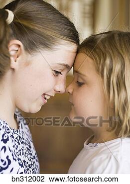 Stock Photo - girls face to 
face. fotosearch 
- search stock 
photos, pictures, 
images, and photo 
clipart