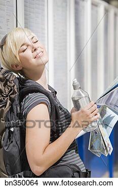 Stock Photo - young woman smiling 
with eyes closed. 
fotosearch - search 
stock photos, 
pictures, images, 
and photo clipart