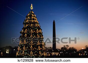 Stock Photo - washington dc 
washington monument 
and christmas 
tree at sunset. 
fotosearch - search 
stock photos, 
pictures, images, 
and photo clipart