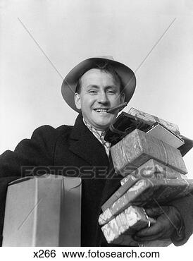 Stock Photo - 1930 1930s man 
cigar in mouth 
hat carrying wrapped 
presents. fotosearch 
- search stock 
photos, pictures, 
images, and photo 
clipart