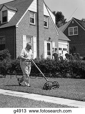 Stock Photo - 1940s 1950s elderly 
overweight man 
pushing lawn mower 
in front of. fotosearch 
- search stock 
photos, pictures, 
images, and photo 
clipart
