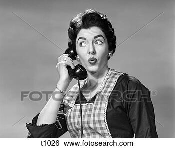 Stock Photo - 1950 1950s woman 
wearing apron 
talking on telephone 
with exaggerated. 
fotosearch - search 
stock photos, 
pictures, images, 
and photo clipart