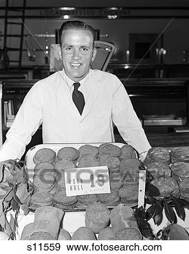 Stock Photograph - 1950s man grocer 
butcher smiling 
raw meat pork 
roll 19 cents 
store. fotosearch 
- search stock 
photos, pictures, 
images, and photo 
clipart