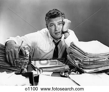 Stock Photography - 1950s portrait 
man overworked 
with desk full 
of papers. fotosearch 
- search stock 
photos, pictures, 
images, and photo 
clipart