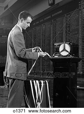 Stock Photography - 1960s stock broker 
reading ticker 
tape in front 
of ny stock exchange. 
fotosearch - search 
stock photos, 
pictures, images, 
and photo clipart