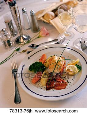 Stock Photo - dinner table setting 
with lobster entree. 
fotosearch - search 
stock photos, 
pictures, images, 
and photo clipart