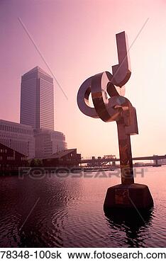 Stock Photo - modern sculpture 
piece in water, 
 canary wharf, 
 docklands,  london. 
fotosearch - search 
stock photos, 
pictures, images, 
and photo clipart