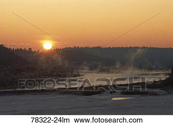 Stock Photo - sunrise over yellowstone 
river in winter, 
montana. fotosearch 
- search stock 
photos, pictures, 
images, and photo 
clipart