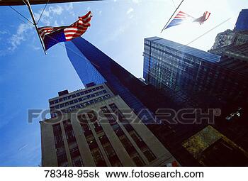 Stock Photo - us flag flying 
from building 
on 5th avenue, 
 midtown manhattan, 
 new. fotosearch 
- search stock 
photos, pictures, 
images, and photo 
clipart