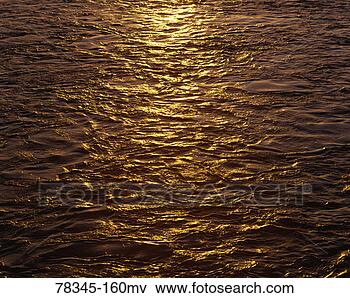Picture - water surface 
on river at sunset. 
fotosearch - search 
stock photos, 
pictures, images, 
and photo clipart