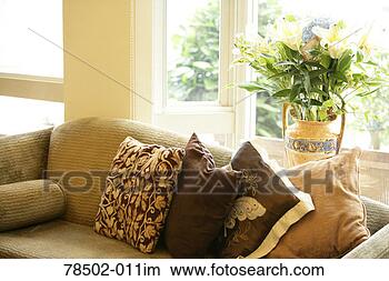 Stock Photo - couch with potted 
plant. fotosearch 
- search stock 
photos, pictures, 
images, and photo 
clipart