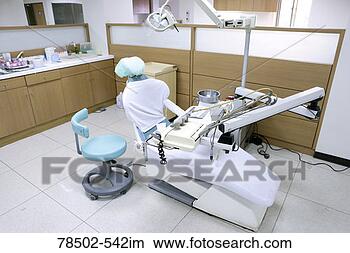 Stock Photo - dentist's chair 
in exam room. 
fotosearch - search 
stock photos, 
pictures, images, 
and photo clipart