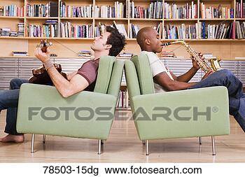 Stock Photo - men playing musical 
instruments. fotosearch 
- search stock 
photos, pictures, 
images, and photo 
clipart