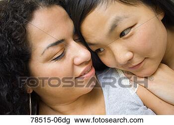 Stock Photo - close-up of women 
embracing. fotosearch 
- search stock 
photos, pictures, 
images, and photo 
clipart