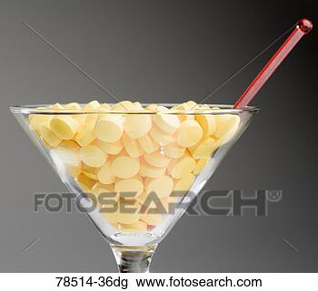 Stock Photo - pills in cocktail 
glass. fotosearch 
- search stock 
photos, pictures, 
images, and photo 
clipart