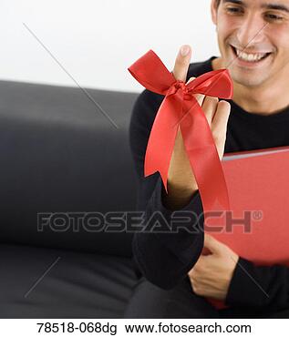 Stock Photo - man with red ribbon 
tied around finger. 
fotosearch - search 
stock photos, 
pictures, images, 
and photo clipart