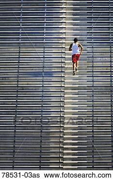 Stock Photo - man running up 
stadium steps. 
fotosearch - search 
stock photos, 
pictures, images, 
and photo clipart