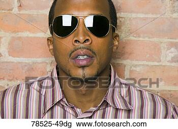Stock Photo - man with sunglasses. 
fotosearch - search 
stock photos, 
pictures, images, 
and photo clipart