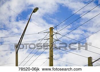 Stock Photo - power lines and 
streetlight. fotosearch 
- search stock 
photos, pictures, 
images, and photo 
clipart