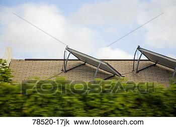 Stock Photo - solar panels on 
roof. fotosearch 
- search stock 
photos, pictures, 
images, and photo 
clipart