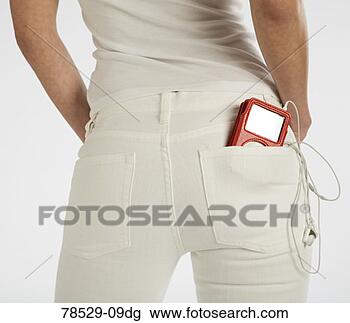 Stock Photo - woman with digital 
music player in 
pocket. fotosearch 
- search stock 
photos, pictures, 
images, and photo 
clipart